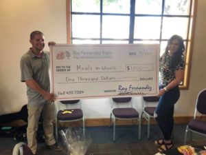 Steven Fernandez presenting MOW with a giant check for $1000!